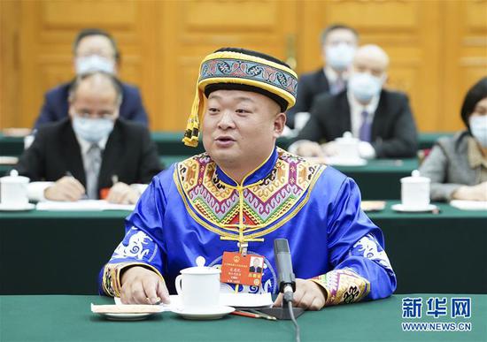  5月24日，全國人大代表宋慶禮參加湖北代表團(tuán)的審議并發(fā)言。新華社記者 黃敬文 攝